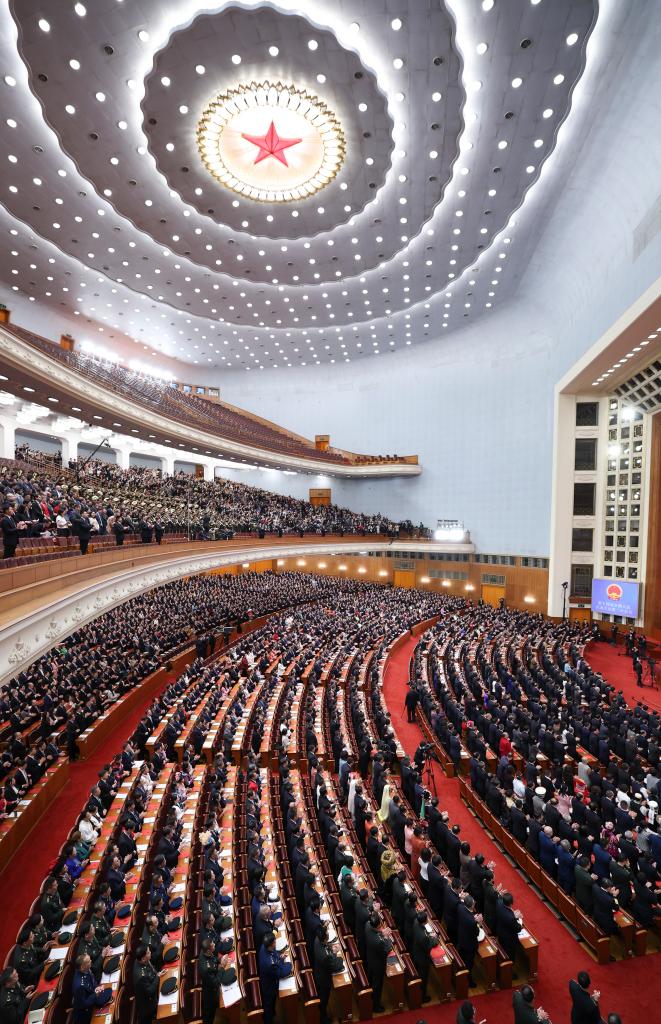 3月11日，第十四屆全國人民代表大會第二次會議在北京人民大會堂舉行閉幕會。新華社記者 丁林 攝